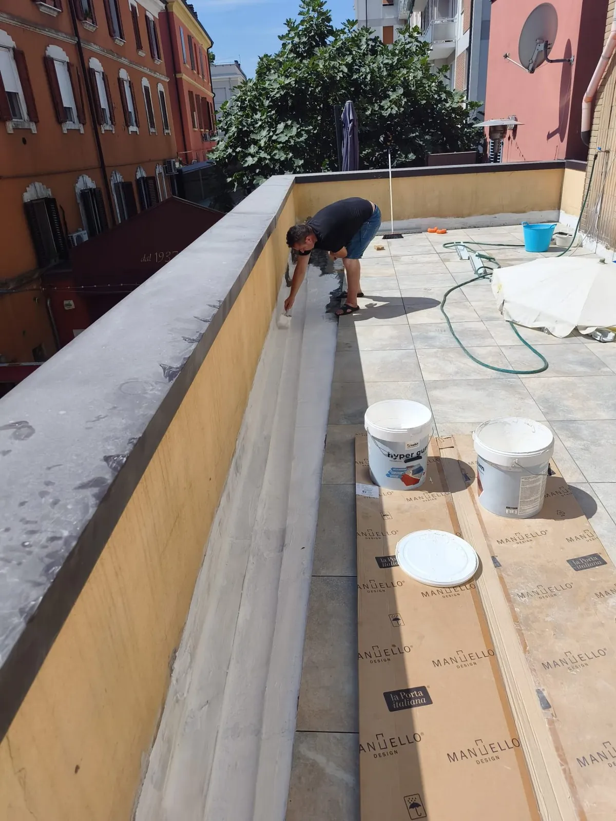 Terrazzo — Sigillatura foro di scolo con guaina cementizia — Esterni e facciate a Modena